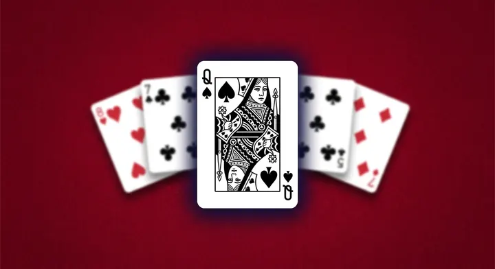 The queen of spades, the biggest penalty card, landing in a player's trick in Hearts